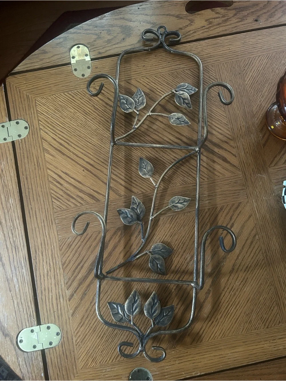 Vintage Wrought Iron Wall Plate Display Rack with Leaf Motif in Aged Bronze